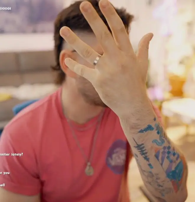 Julien Solomita shows off his engagement band