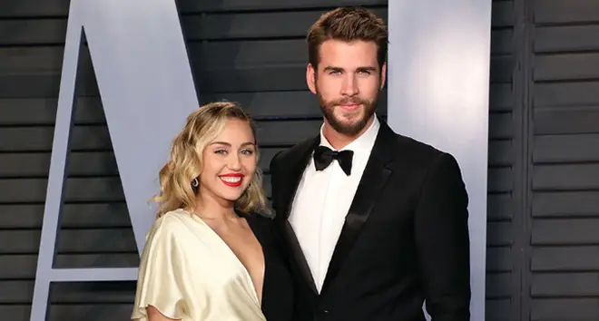 Miley Cyrus and Liam Hemsworth attend the 2018 Vanity Fair Oscar Party.