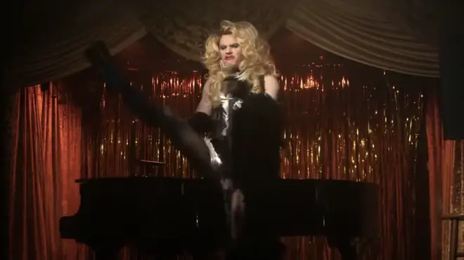 Evan Peters performs as a drag queen in AHS: Double Feature episode 4