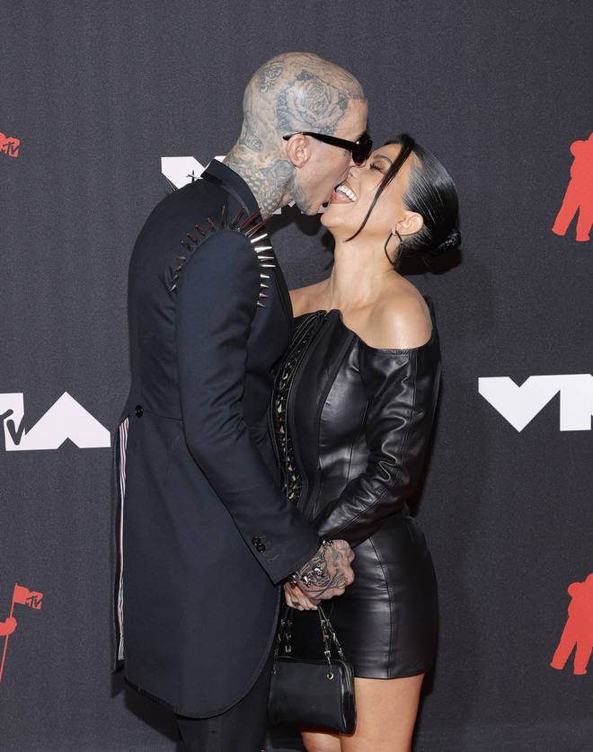 Travis Barker and Kourtney Kardashian attend the 2021 MTV Video Music Awards