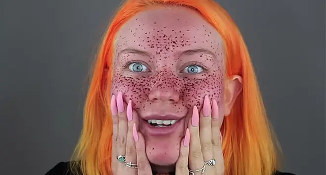 Naomi Jon with faux freckles.
