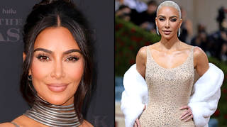 Kim Kardashian has to have help squashing her butt into Marilyn Monroe's dress