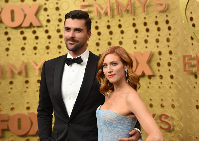 Brittany Snow and Tyler Stanaland attend the Emmys in 2019