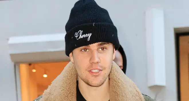 Justin Bieber shows off a 'Drew' shirt when out and about on February 26, 2019.