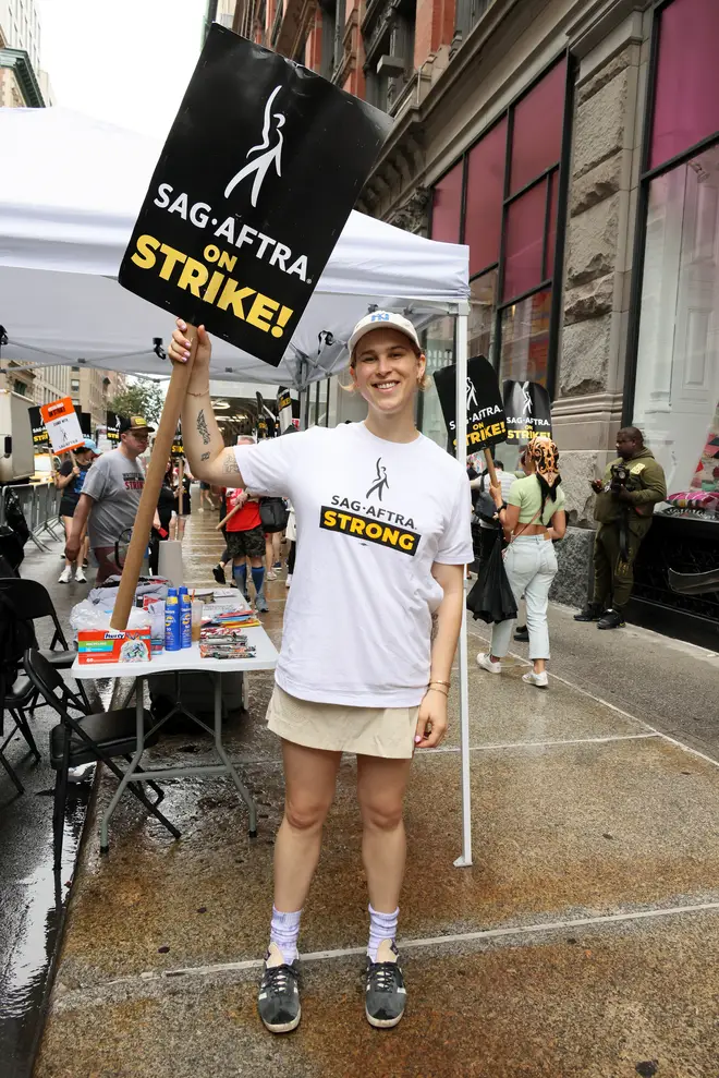 Tommy Dorfman joins SAG-AFTRA members on the picket line outside of Netflix