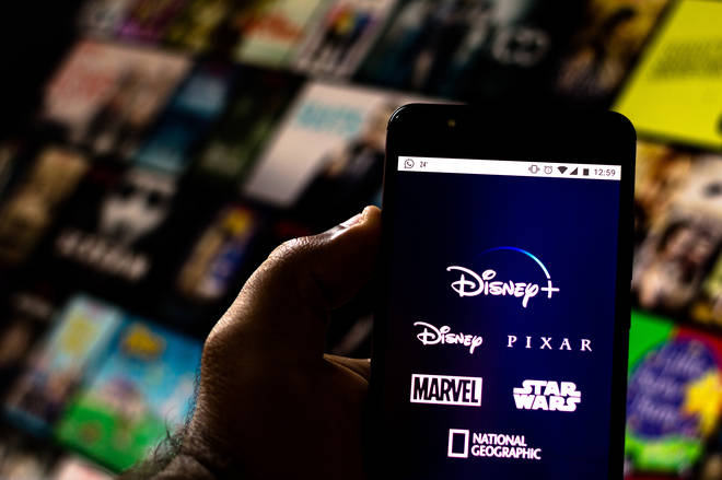 In this photo illustration the Disney+ (Plus) logo is seen...
